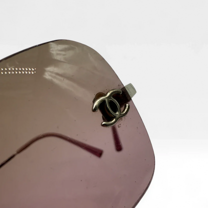 https://cdn.shopify.com/s/files/1/0564/9376/8855/files/Chanel__Sonnenbrille__Rahmenlos__vintage__luxury__CC__sunglasses022.webp?v=1748426680