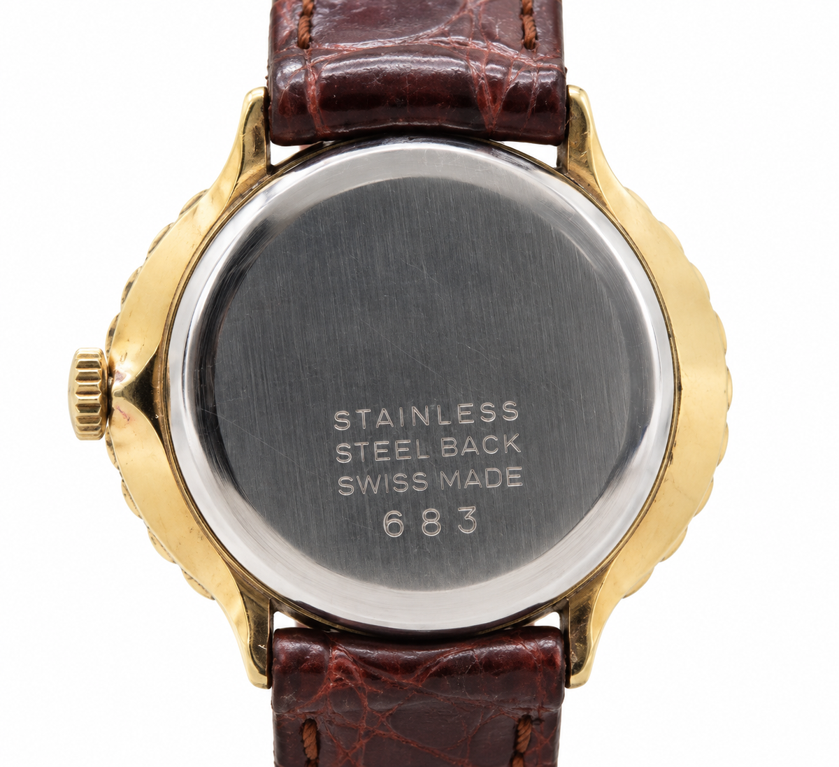 Raymond Weil Genève 683 Champagne Manual Wind Watch (777-RAY-L). LWM864 | O/S, Champagne, Gold, Brown