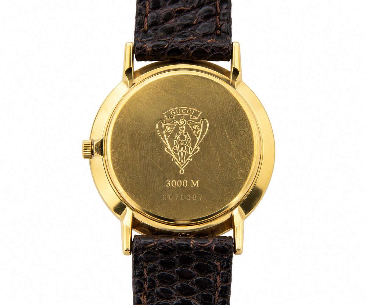 1990s Gucci 3000M Champagne Dial Brown Leather Strap Watch(1511-GUC-L). LWM864 | O/S, Brown