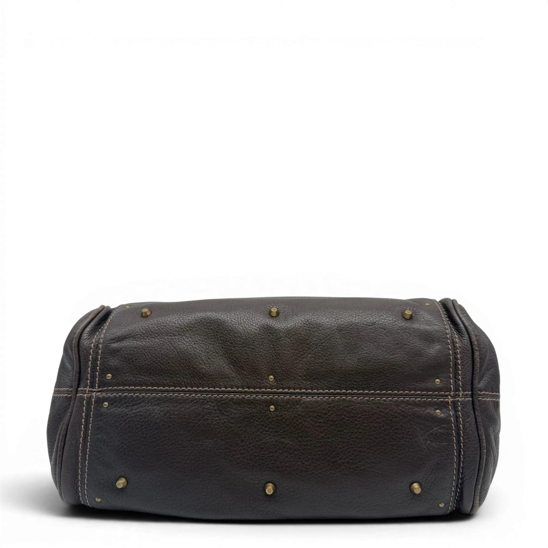 https://cdn.shopify.com/s/files/1/0564/9376/8855/files/Chloe_Handtasche_Paddington_aus_Leder_dunkelbraun_vintage6987.webp?v=1779290033