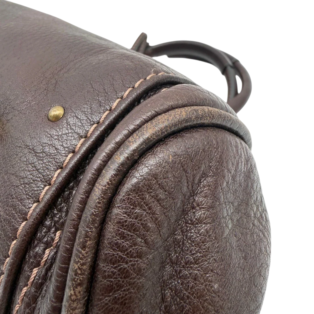 https://cdn.shopify.com/s/files/1/0564/9376/8855/files/Chloe_Handtasche_Paddington_aus_Leder_dunkelbraun_vintage6988.webp?v=1779290033