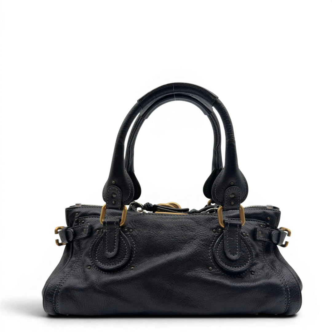 https://cdn.shopify.com/s/files/1/0564/9376/8855/files/Chloe_Handtasche_Paddington_aus_Leder_schwarz_vintage7225.webp?v=1778683778