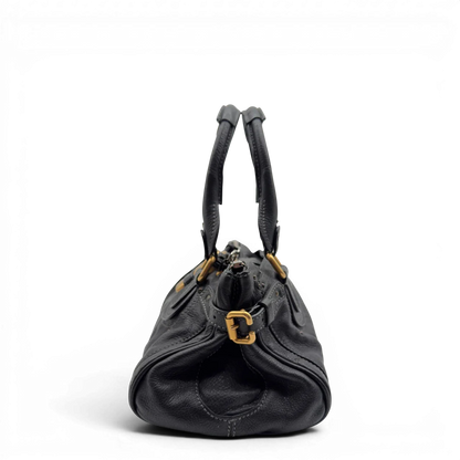 https://cdn.shopify.com/s/files/1/0564/9376/8855/files/Chloe_Handtasche_Paddington_aus_Leder_schwarz_vintage7227.webp?v=1778683778