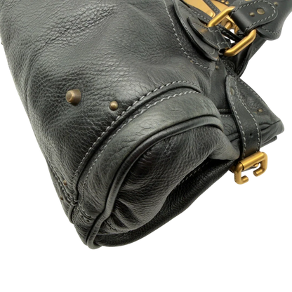 https://cdn.shopify.com/s/files/1/0564/9376/8855/files/Chloe_Handtasche_Paddington_aus_Leder_schwarz_vintage7229.webp?v=1778683779