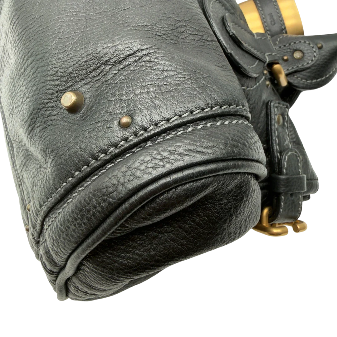 https://cdn.shopify.com/s/files/1/0564/9376/8855/files/Chloe_Handtasche_Paddington_aus_Leder_schwarz_vintage7231.webp?v=1778683779