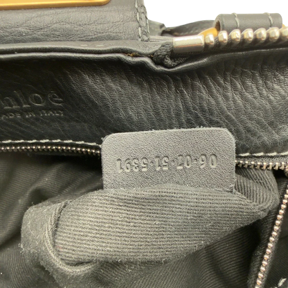 https://cdn.shopify.com/s/files/1/0564/9376/8855/files/Chloe_Handtasche_Paddington_aus_Leder_schwarz_vintage7240.webp?v=1778683779