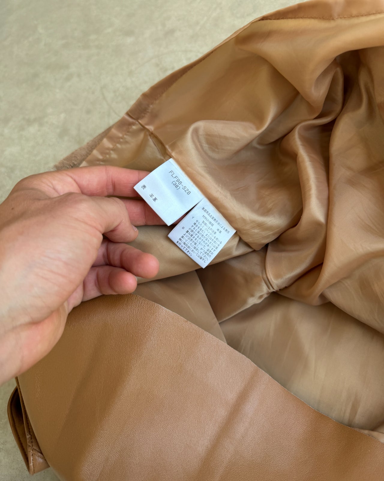 Burberry Blue Label Brown Leather Midi Skirt – XS/S-on a concrete background
