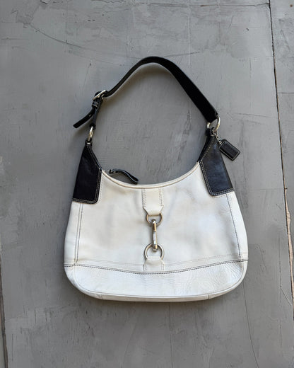 Coach Two Tone Leather Shoulder Bag-on a concrete background