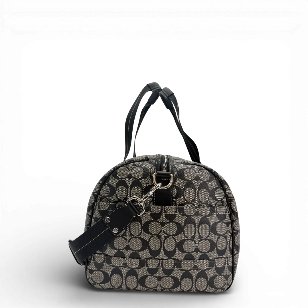 https://cdn.shopify.com/s/files/1/0564/9376/8855/files/CoachReisetasche50mitUmhangegurtSignaturegrau_9887.webp?v=1770951976