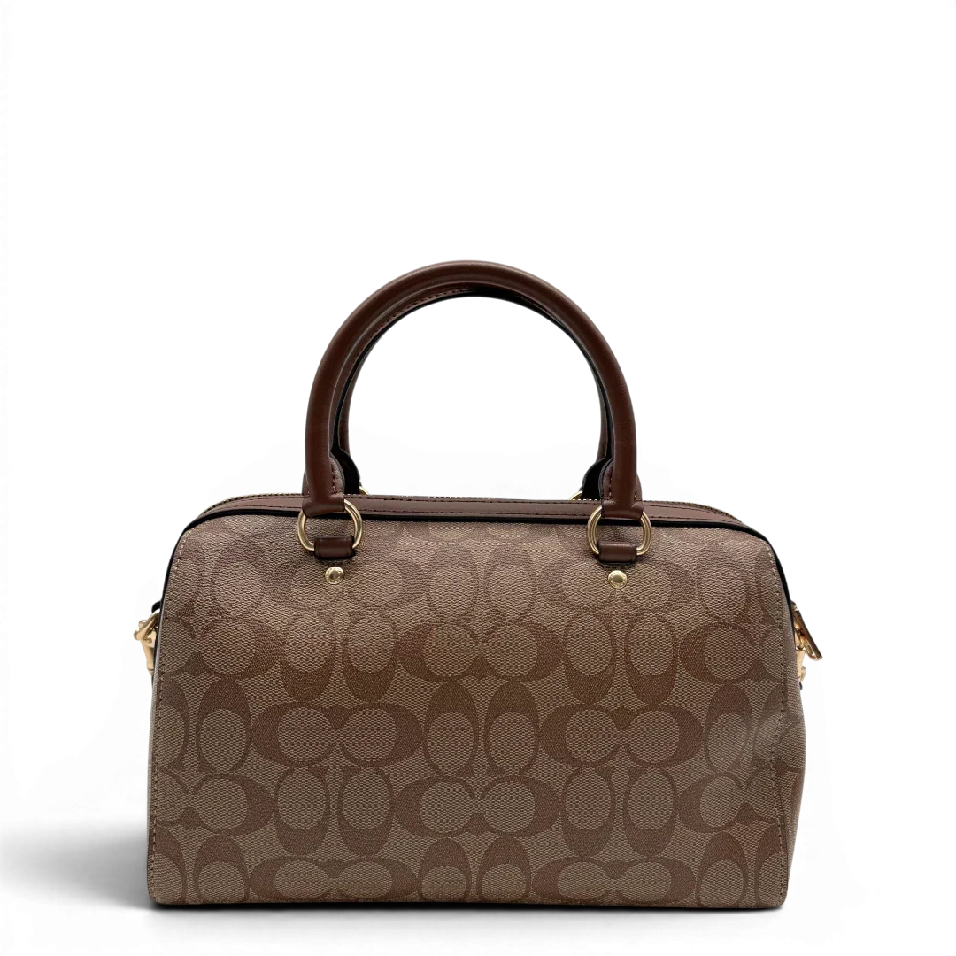 https://cdn.shopify.com/s/files/1/0564/9376/8855/files/Coach_Handtasche_Boston_25_mit_Umhangegurt_Signature_braun_vintage6438.webp?v=1778673462