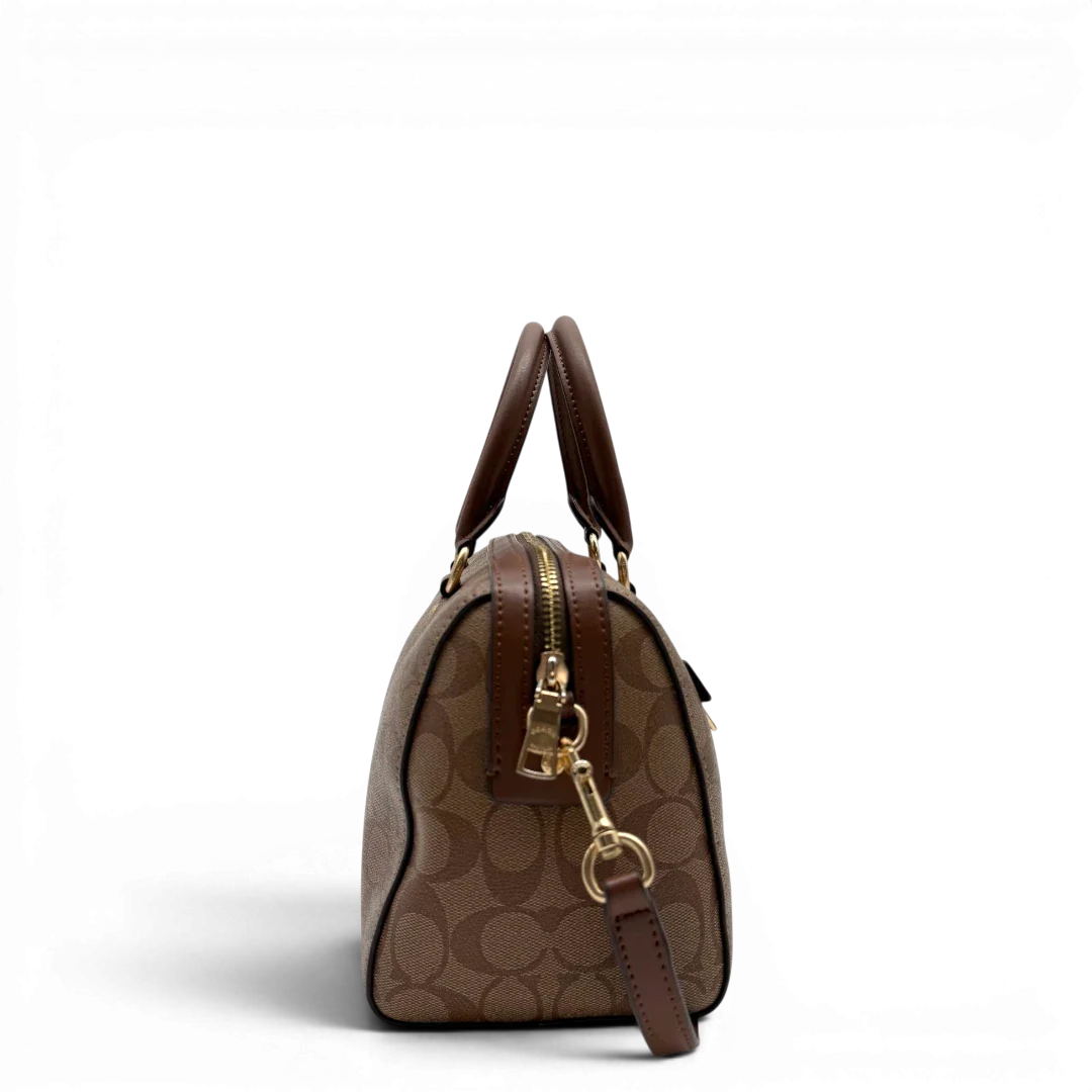 https://cdn.shopify.com/s/files/1/0564/9376/8855/files/Coach_Handtasche_Boston_25_mit_Umhangegurt_Signature_braun_vintage6441.webp?v=1778673462
