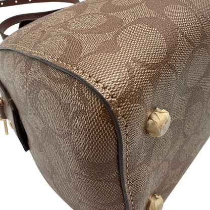 https://cdn.shopify.com/s/files/1/0564/9376/8855/files/Coach_Handtasche_Boston_25_mit_Umhangegurt_Signature_braun_vintage6443.webp?v=1778673462