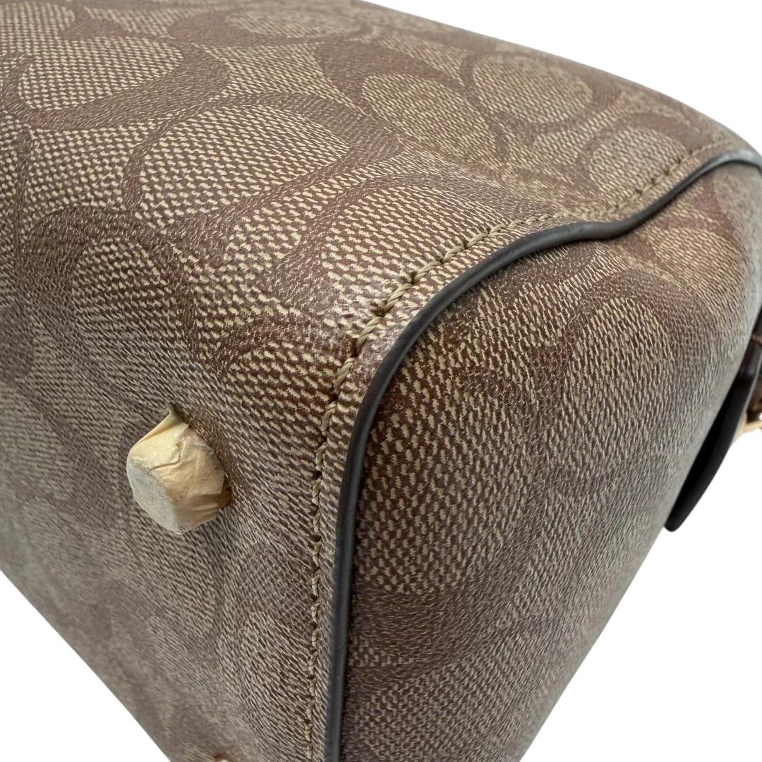 https://cdn.shopify.com/s/files/1/0564/9376/8855/files/Coach_Handtasche_Boston_25_mit_Umhangegurt_Signature_braun_vintage6446.webp?v=1778673462