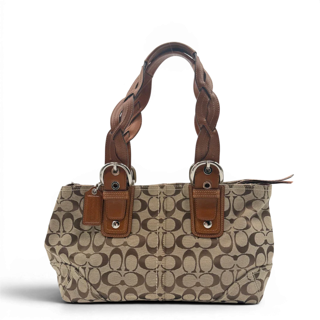 https://cdn.shopify.com/s/files/1/0564/9376/8855/files/Coach_Handtasche_Campus_Signature_beige_1.webp?v=1782312571