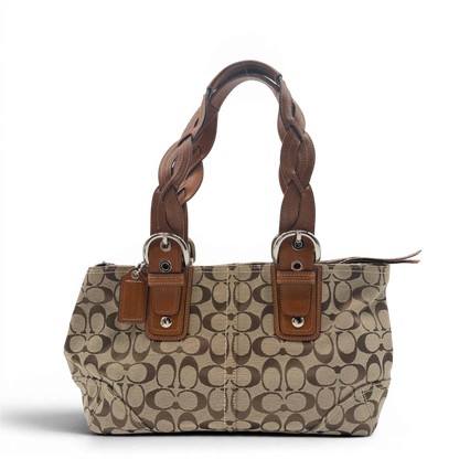 https://cdn.shopify.com/s/files/1/0564/9376/8855/files/Coach_Handtasche_Campus_Signature_beige_1.webp?v=1782312571