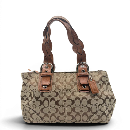 https://cdn.shopify.com/s/files/1/0564/9376/8855/files/Coach_Handtasche_Campus_Signature_beige_2.webp?v=1782312571