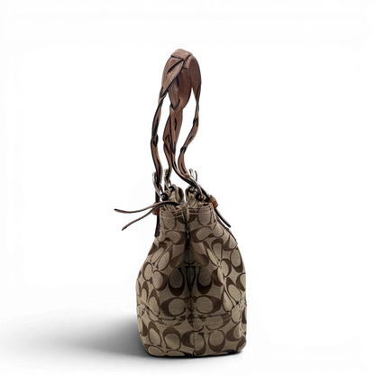 https://cdn.shopify.com/s/files/1/0564/9376/8855/files/Coach_Handtasche_Campus_Signature_beige_3.webp?v=1782312571