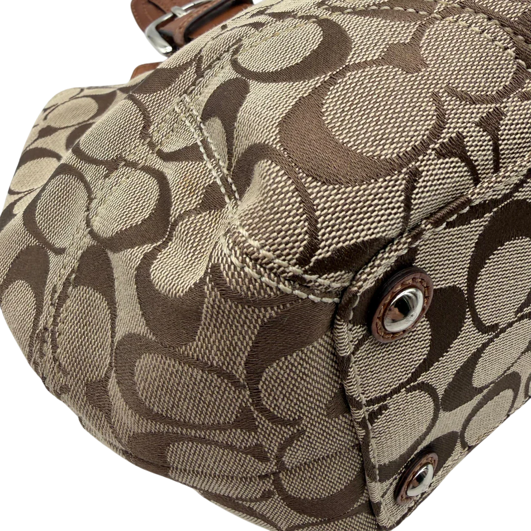 https://cdn.shopify.com/s/files/1/0564/9376/8855/files/Coach_Handtasche_Campus_Signature_beige_9.webp?v=1782312572