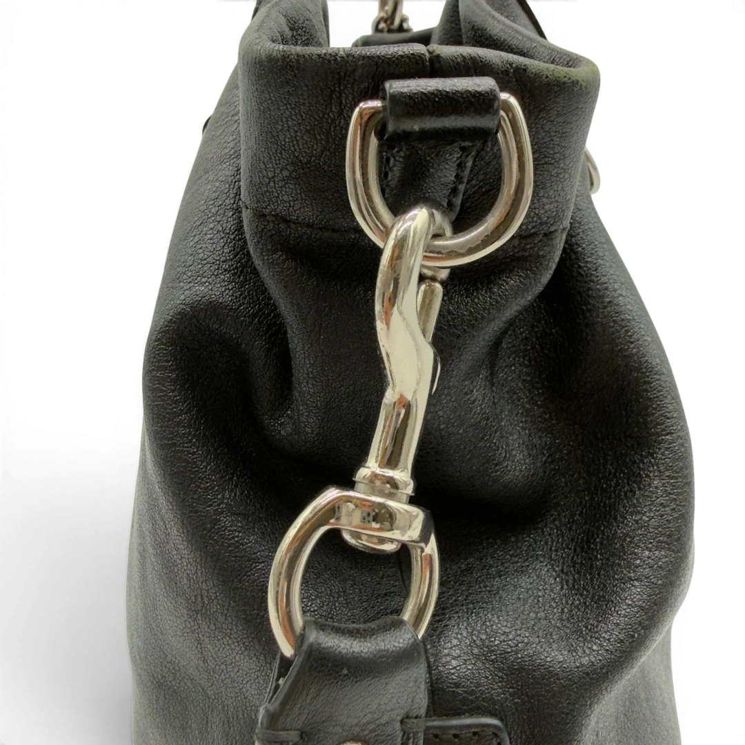 https://cdn.shopify.com/s/files/1/0564/9376/8855/files/Coach_Handtasche_Carryall_mit_Umhangegurt_aus_Leder_schwarz_12.webp?v=1782385670