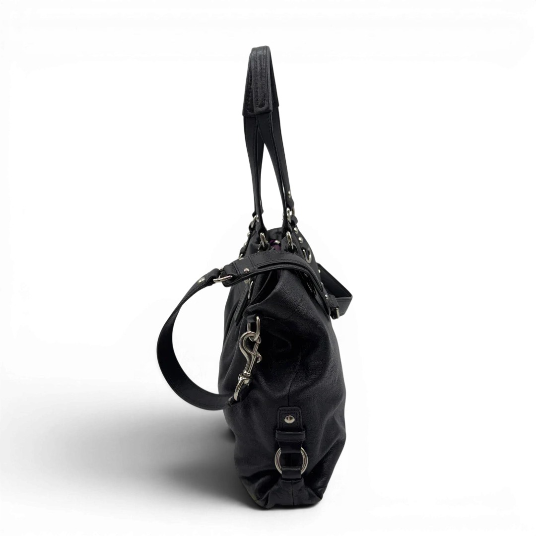 https://cdn.shopify.com/s/files/1/0564/9376/8855/files/Coach_Handtasche_Carryall_mit_Umhangegurt_aus_Leder_schwarz_4.webp?v=1782385669