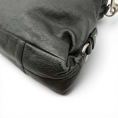 https://cdn.shopify.com/s/files/1/0564/9376/8855/files/Coach_Handtasche_Carryall_mit_Umhangegurt_aus_Leder_schwarz_8.webp?v=1782385670