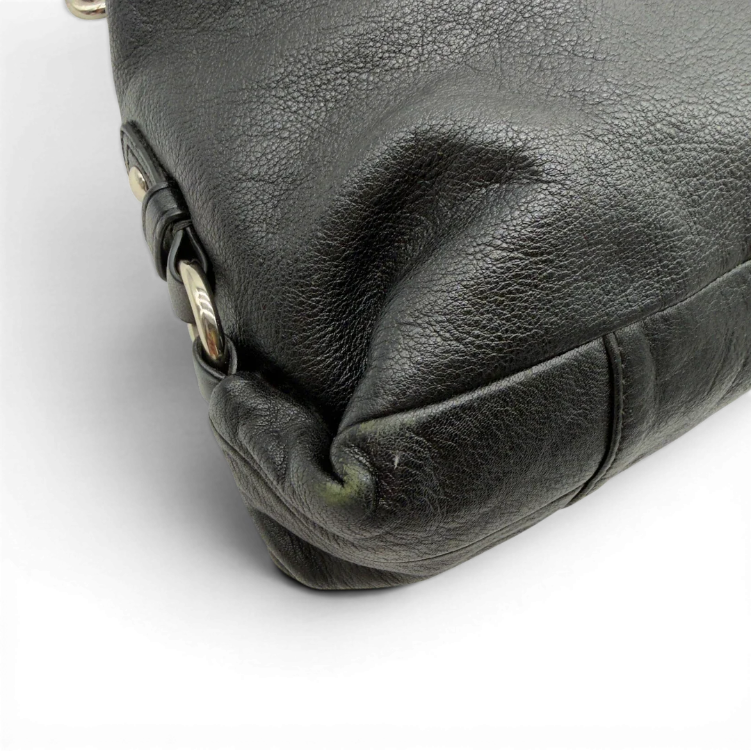 https://cdn.shopify.com/s/files/1/0564/9376/8855/files/Coach_Handtasche_Carryall_mit_Umhangegurt_aus_Leder_schwarz_9.webp?v=1782385670
