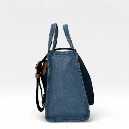 https://cdn.shopify.com/s/files/1/0564/9376/8855/files/Coach_Handtasche_Denim_Tote_bag_blau_vintage_handbag9433.webp?v=1761265739