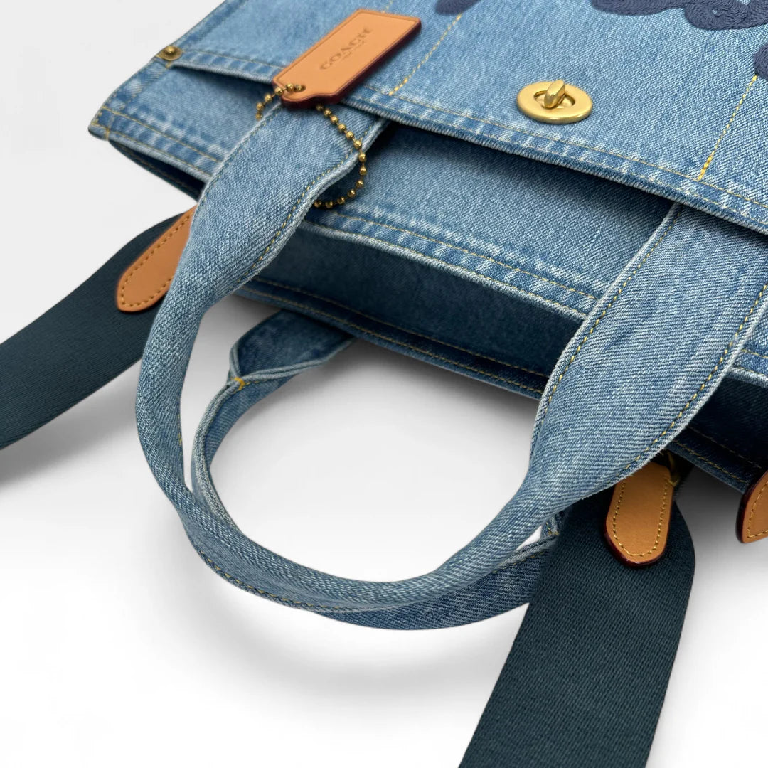 https://cdn.shopify.com/s/files/1/0564/9376/8855/files/Coach_Handtasche_Denim_Tote_bag_blau_vintage_handbag9437.webp?v=1761265739