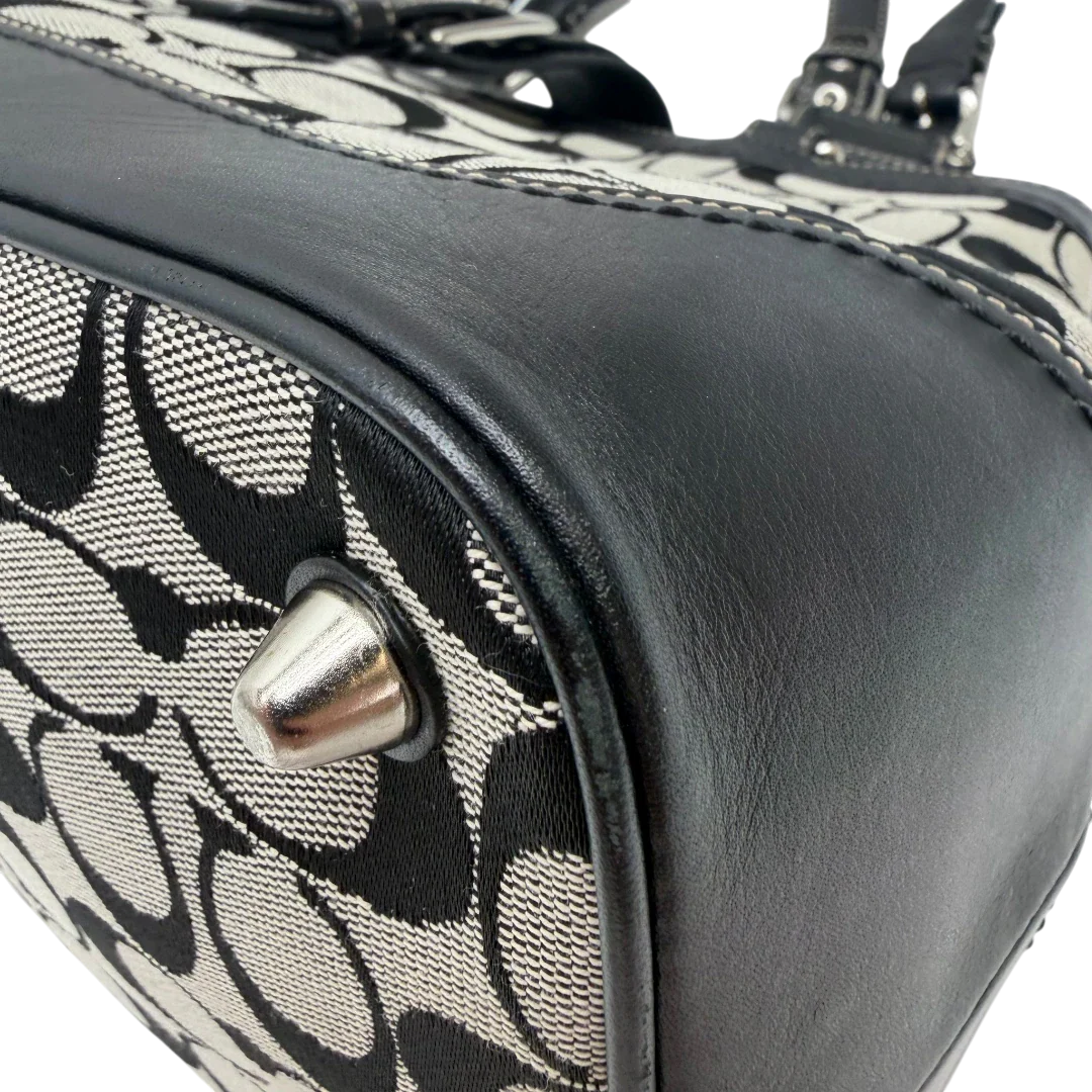 https://cdn.shopify.com/s/files/1/0564/9376/8855/files/Coach_Handtasche_Hamptons_Signature_grau___schwarz_vintage7677.webp?v=1780487716