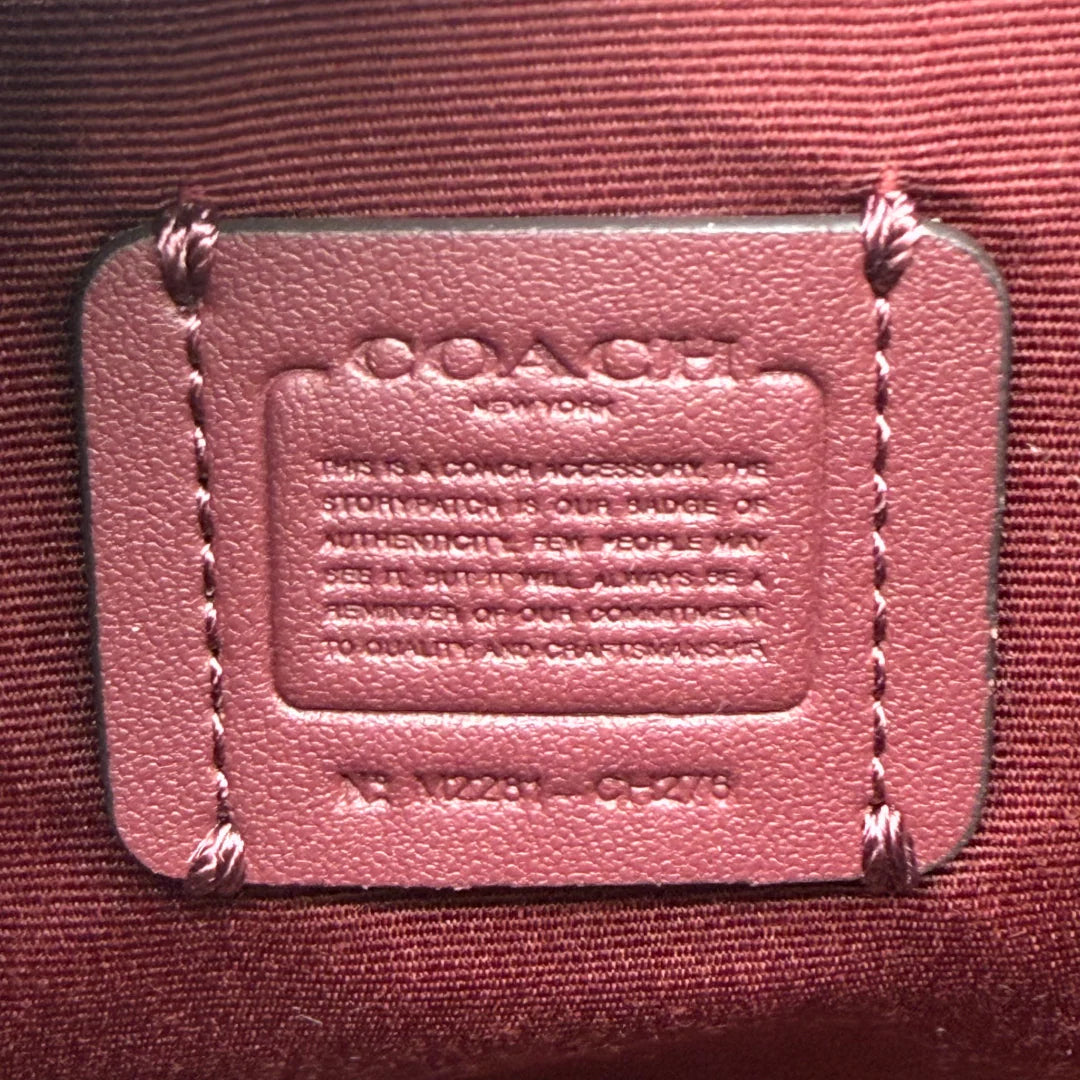 https://cdn.shopify.com/s/files/1/0564/9376/8855/files/Coach_Handtasche_Mini_Boston_aus_Leder_pink_vintage_4557.webp?v=1765402369