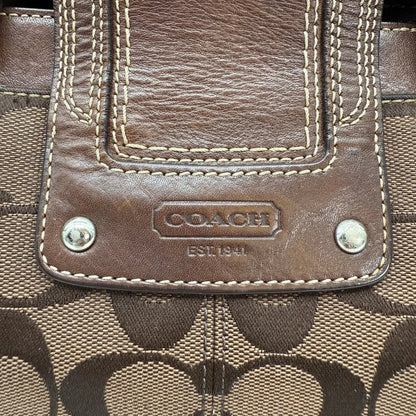 https://cdn.shopify.com/s/files/1/0564/9376/8855/files/Coach_Handtasche_Signature_braun_vintage4953.webp?v=1776850125