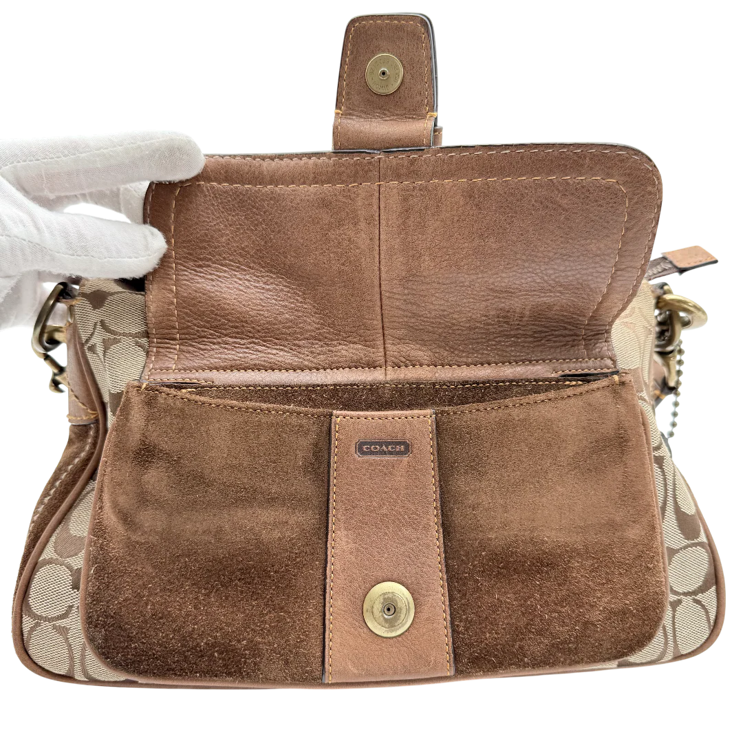 https://cdn.shopify.com/s/files/1/0564/9376/8855/files/Coach_Handtasche_Soho_Flap_Special_Edition_monogram_braun___beige_vintage_1208.webp?v=1771415520