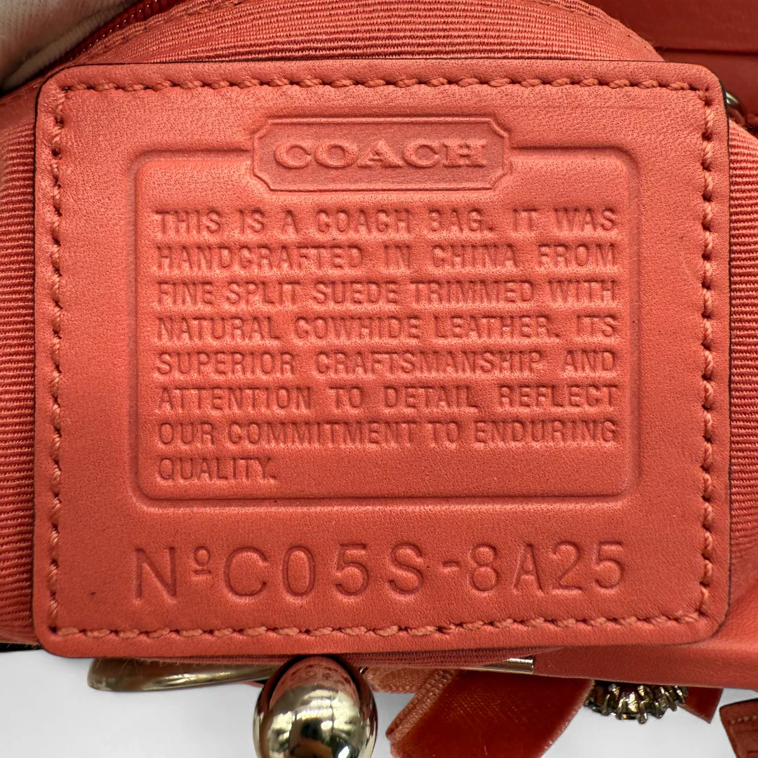 https://cdn.shopify.com/s/files/1/0564/9376/8855/files/Coach_Handtasche_Wildleder_rosa_vintage9477.webp?v=1758891939