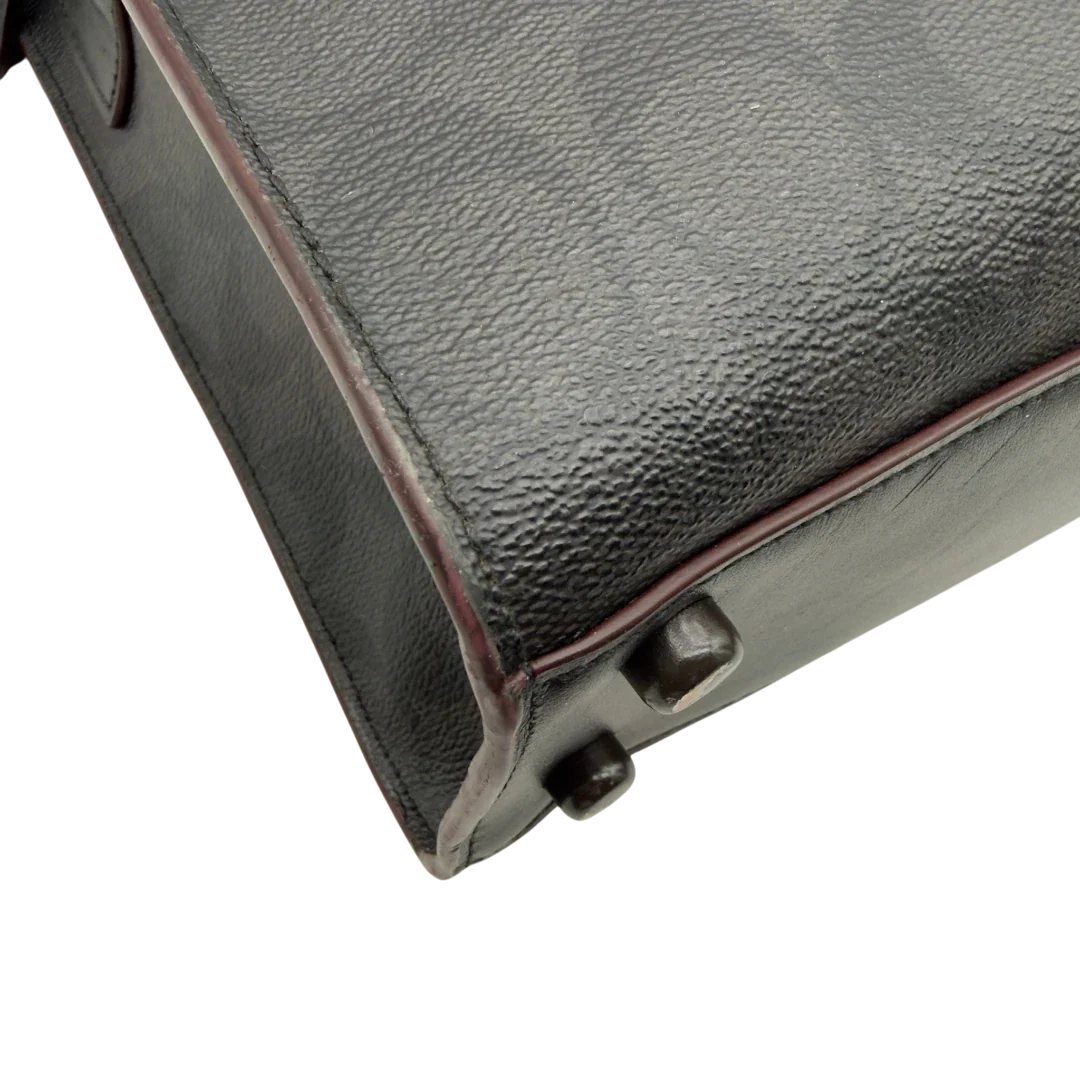 https://cdn.shopify.com/s/files/1/0564/9376/8855/files/Coach_Laptoptasche_Signature_schwarz_vintage8249.webp?v=1780409410