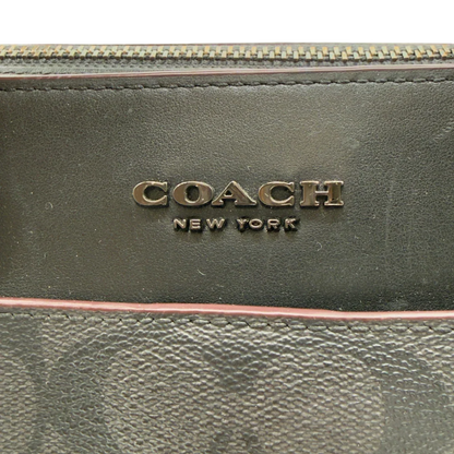 https://cdn.shopify.com/s/files/1/0564/9376/8855/files/Coach_Laptoptasche_Signature_schwarz_vintage8251.webp?v=1780409410
