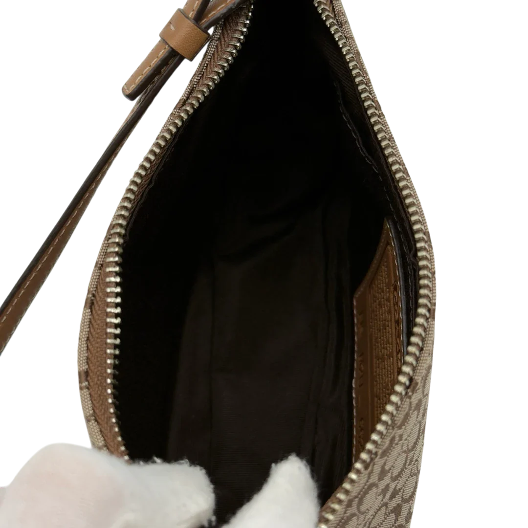 https://cdn.shopify.com/s/files/1/0564/9376/8855/files/Coach_Pochette_Mini_Signature_beige_17.webp?v=1784128021