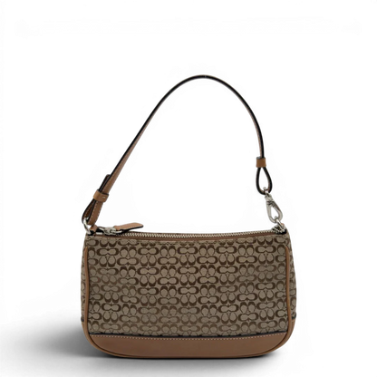 https://cdn.shopify.com/s/files/1/0564/9376/8855/files/Coach_Pochette_Mini_Signature_beige_2.webp?v=1784128021