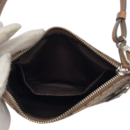 https://cdn.shopify.com/s/files/1/0564/9376/8855/files/Coach_Pochette_Mini_Signature_beige_20.webp?v=1784128021