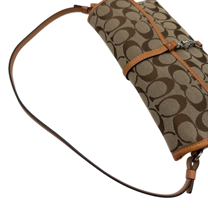 https://cdn.shopify.com/s/files/1/0564/9376/8855/files/Coach_Pochette_Signature_Soho_monogram_beige_10.webp?v=1782311318