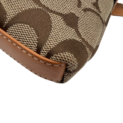 https://cdn.shopify.com/s/files/1/0564/9376/8855/files/Coach_Pochette_Signature_Soho_monogram_beige_6.webp?v=1782311319