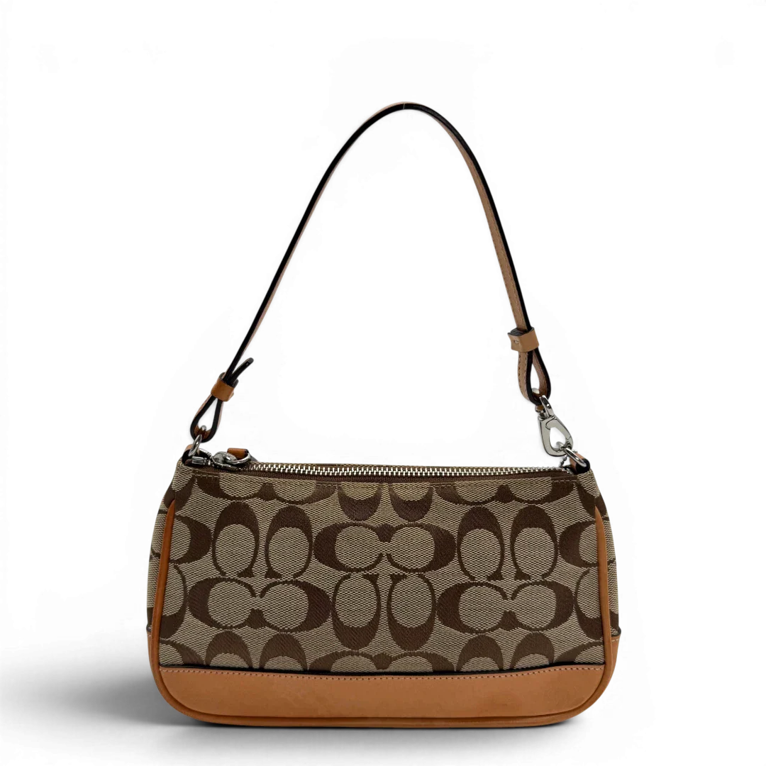 https://cdn.shopify.com/s/files/1/0564/9376/8855/files/Coach_Pochette_Signature_beige_vintage6347.webp?v=1778669418