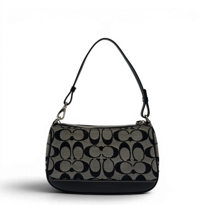 https://cdn.shopify.com/s/files/1/0564/9376/8855/files/Coach_Pochette_Signature_grau___schwarz_2.webp?v=1782910067