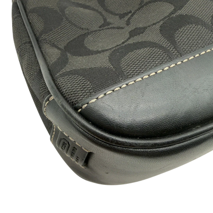 https://cdn.shopify.com/s/files/1/0564/9376/8855/files/Coach_Pochette_Signature_schwarz_vintage8266.webp?v=1780409233