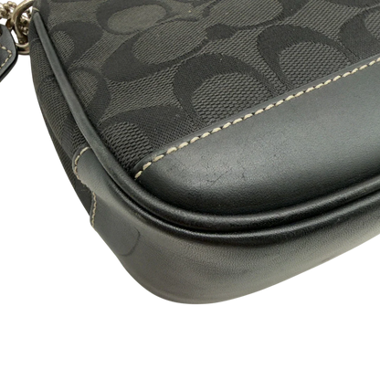 https://cdn.shopify.com/s/files/1/0564/9376/8855/files/Coach_Pochette_Signature_schwarz_vintage8268.webp?v=1780409234
