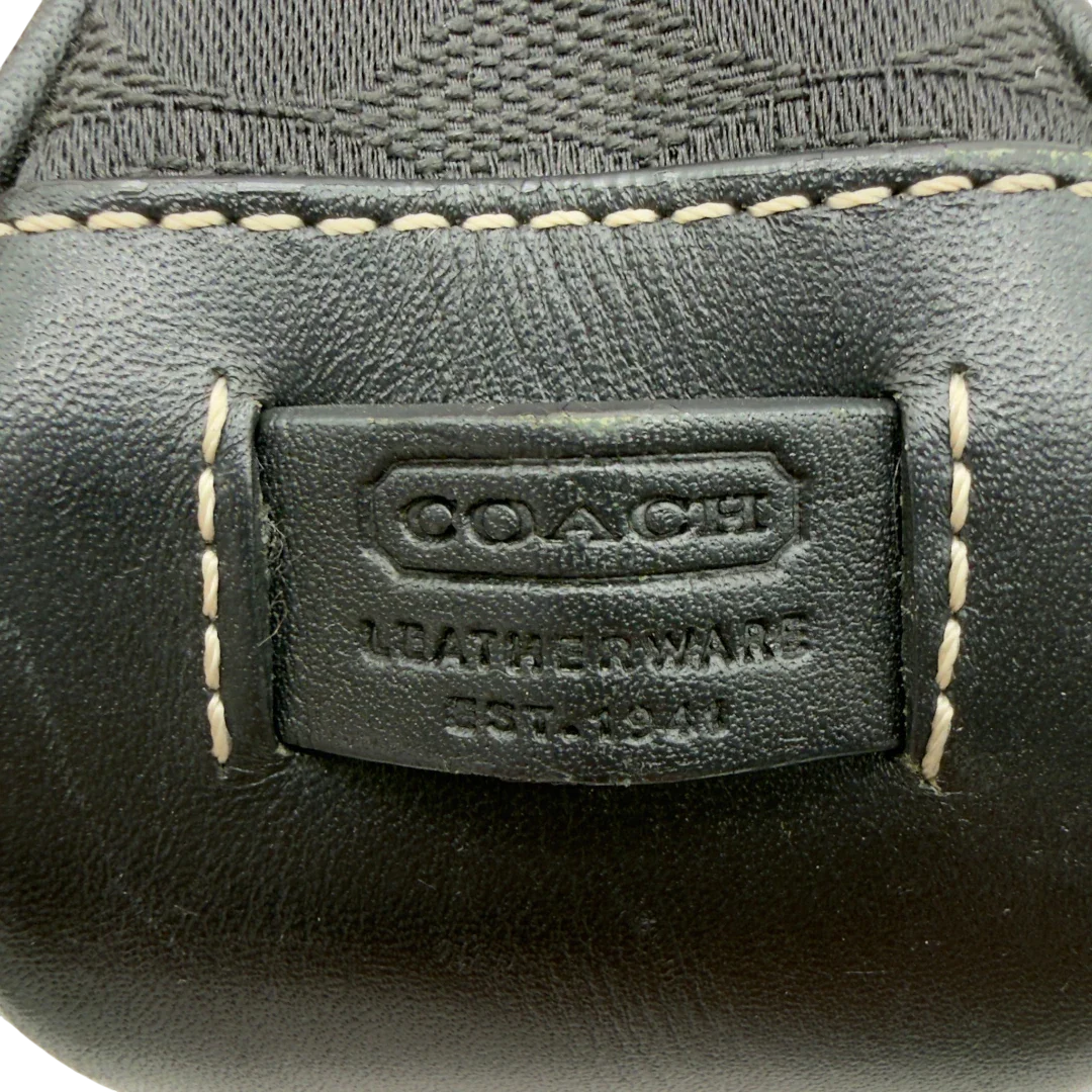 https://cdn.shopify.com/s/files/1/0564/9376/8855/files/Coach_Pochette_Signature_schwarz_vintage8272.webp?v=1780409234