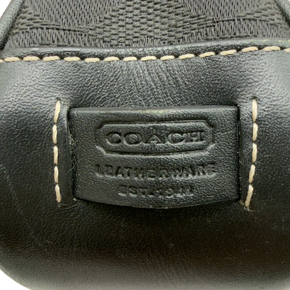 https://cdn.shopify.com/s/files/1/0564/9376/8855/files/Coach_Pochette_Signature_schwarz_vintage8272.webp?v=1780409234