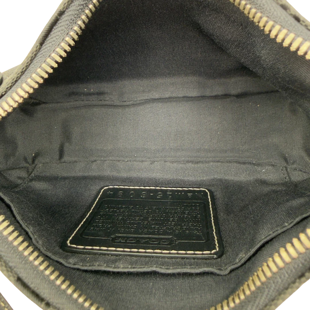 https://cdn.shopify.com/s/files/1/0564/9376/8855/files/Coach_Pochette_Signature_schwarz_vintage8274.webp?v=1780409234