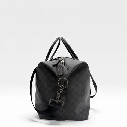 https://cdn.shopify.com/s/files/1/0564/9376/8855/files/Coach_Reisetasche_45_Signature_schwarz_vintage_dufflebag_5885.webp?v=1765451513