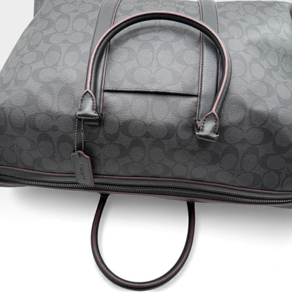 https://cdn.shopify.com/s/files/1/0564/9376/8855/files/Coach_Reisetasche_45_Signature_schwarz_vintage_dufflebag_5891.webp?v=1765451513