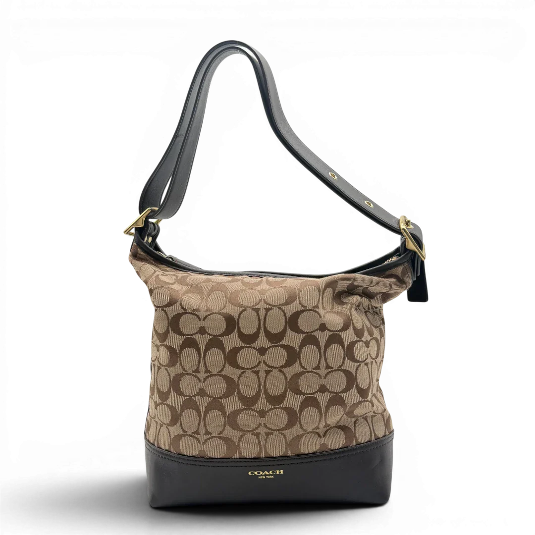https://cdn.shopify.com/s/files/1/0564/9376/8855/files/Coach_Schultertasche_Bucket_Signature_beige___braun_2.webp?v=1782311044